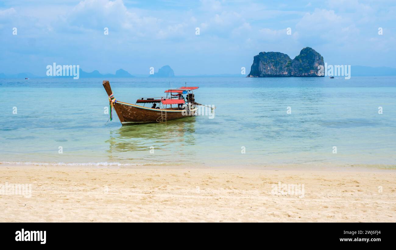 Longtail boats on the beach of Koh Ngai island tropical Island in the