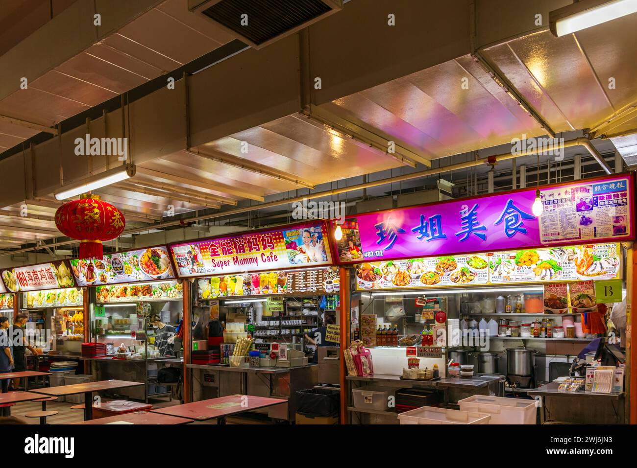 Traditional Asian food stalls in Hawker Center, Chinatown, Singapore Stock Photo