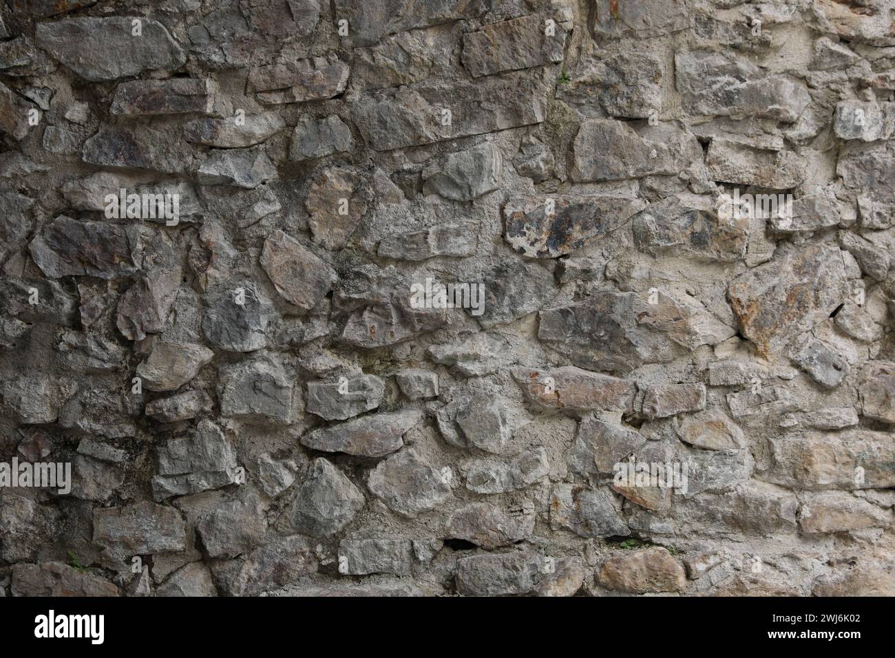 Texture of old stone wall as background Stock Photo - Alamy