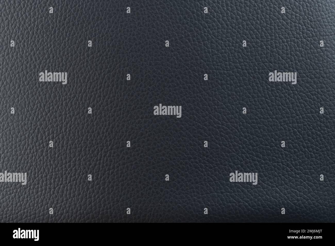 Bright shiny leather bumpy background macro close up view Stock Photo
