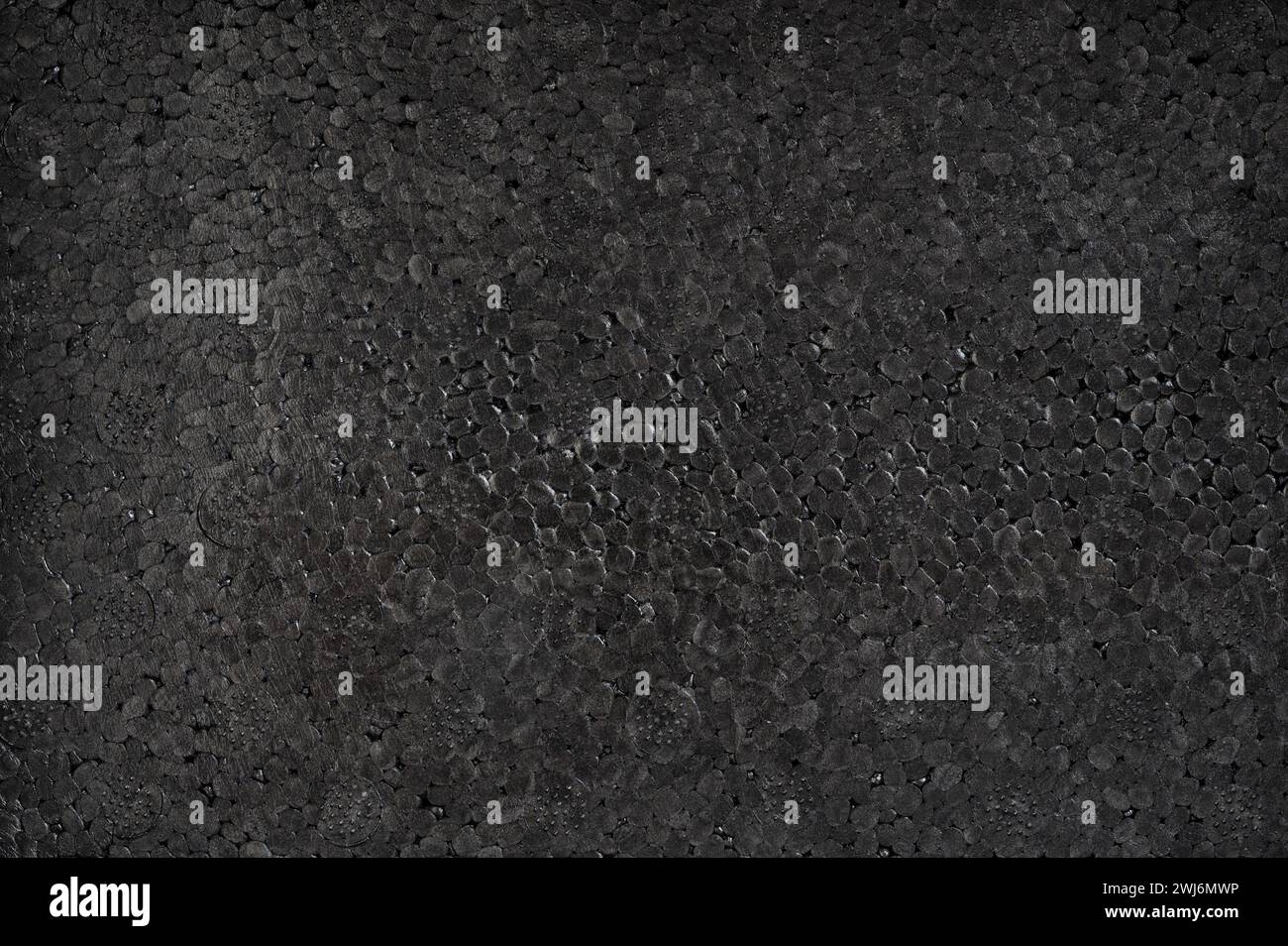 Soft black packing surface with plastic background Stock Photo
