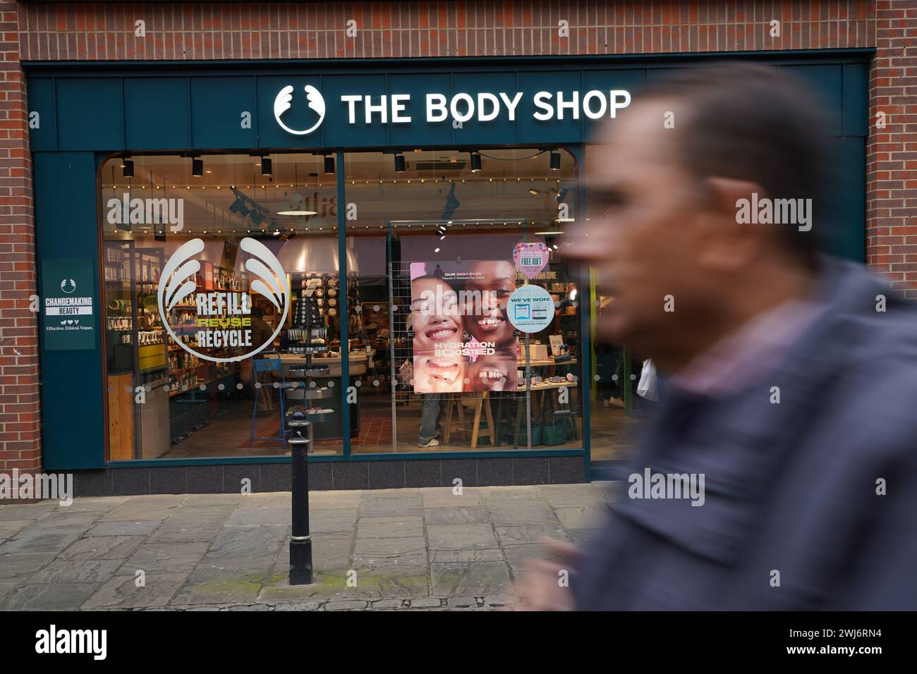 People walk past a Body Shop store in Canterbury. The Body Shop has