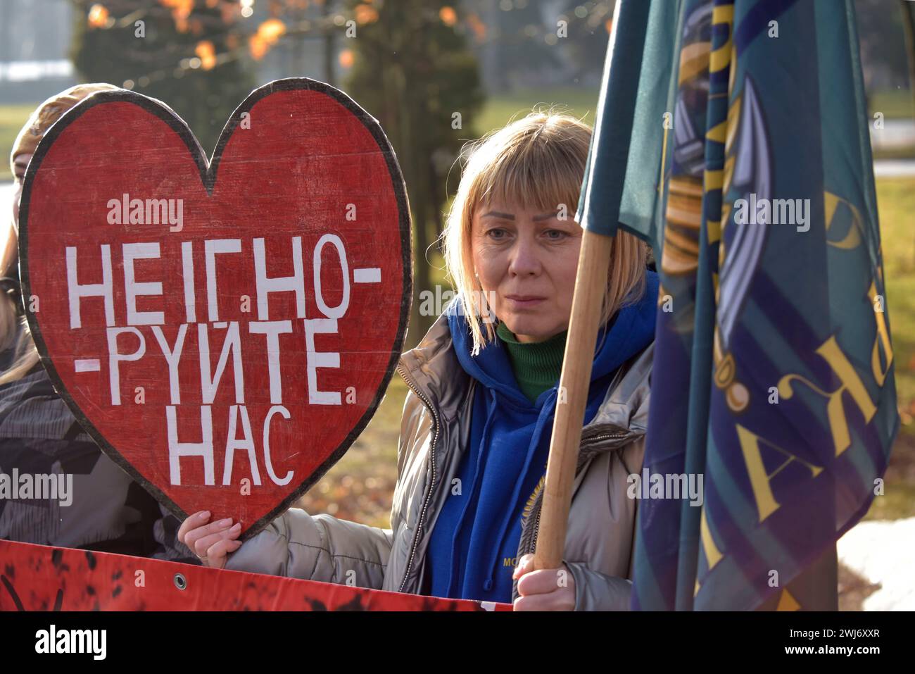 Red Rall Ukraine Non Exclusive: VINNYTSIA, UKRAINE - FEBRUARY 10, 2024 - A woman holds a ...