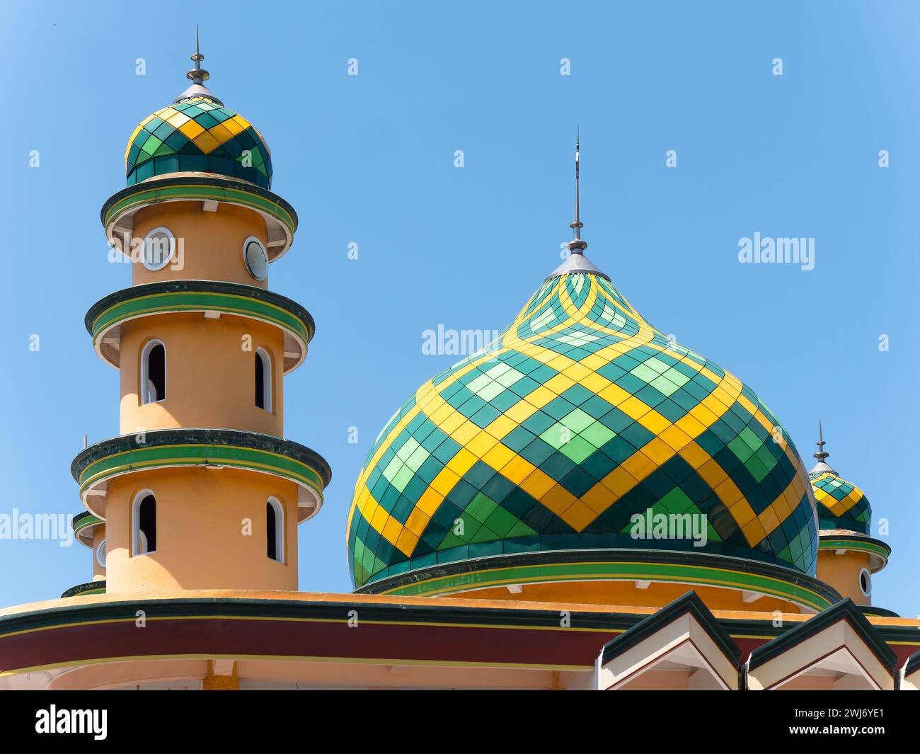 Minaret and dome Jami Masjid Al-Akmal mosque in Medewi, Bali, Indonesia. While Bali is mostly Hindu, more than 9 percent of the population is Muslim, Stock Photo