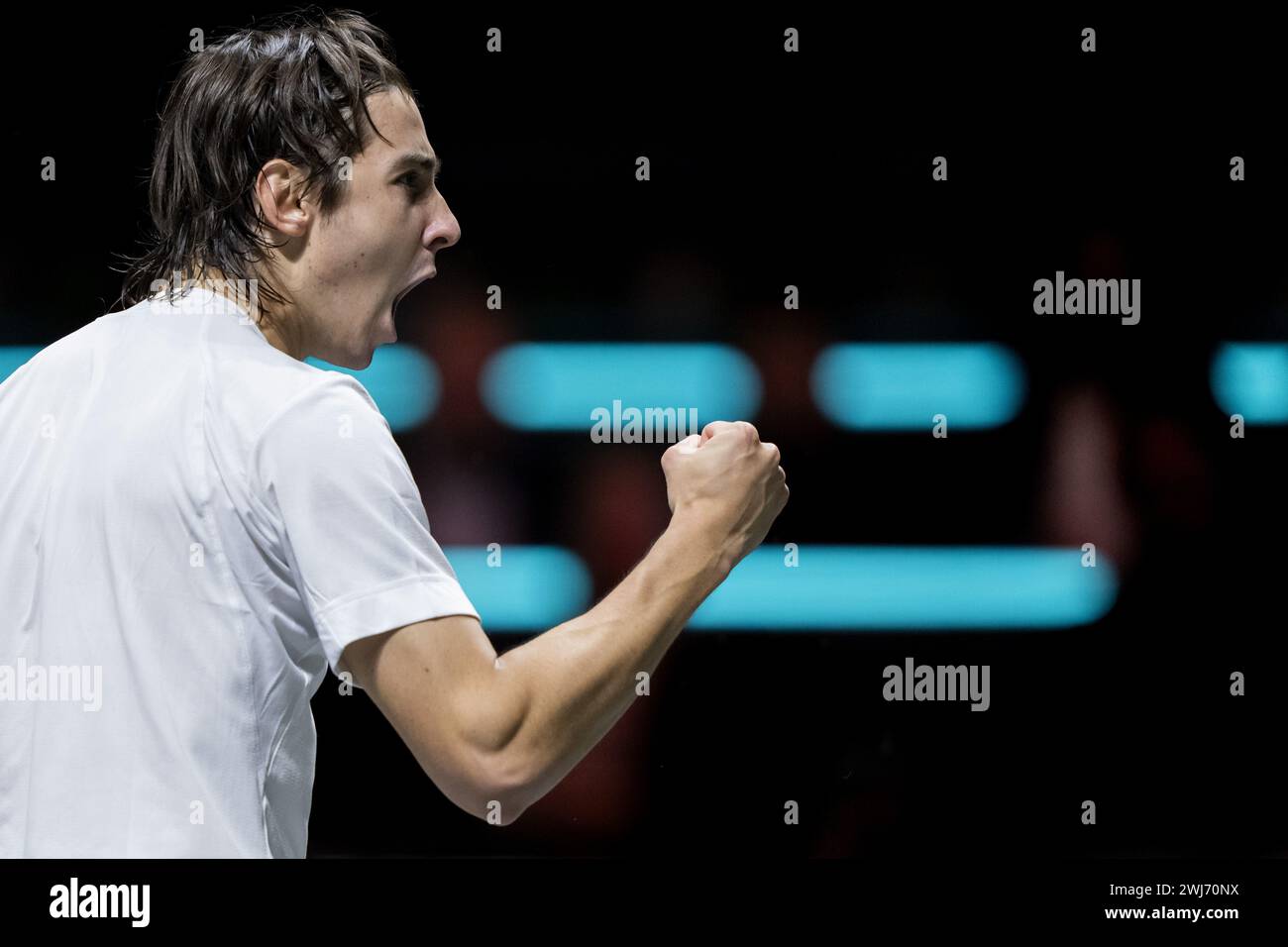 ROTTERDAM - Alexander Shevchenko (KAZ) in action against Zhizhen Zhang (CHN) during the second day of the ABN AMRO Open tennis tournament in Ahoy. ANP SANDER KONING Stock Photo