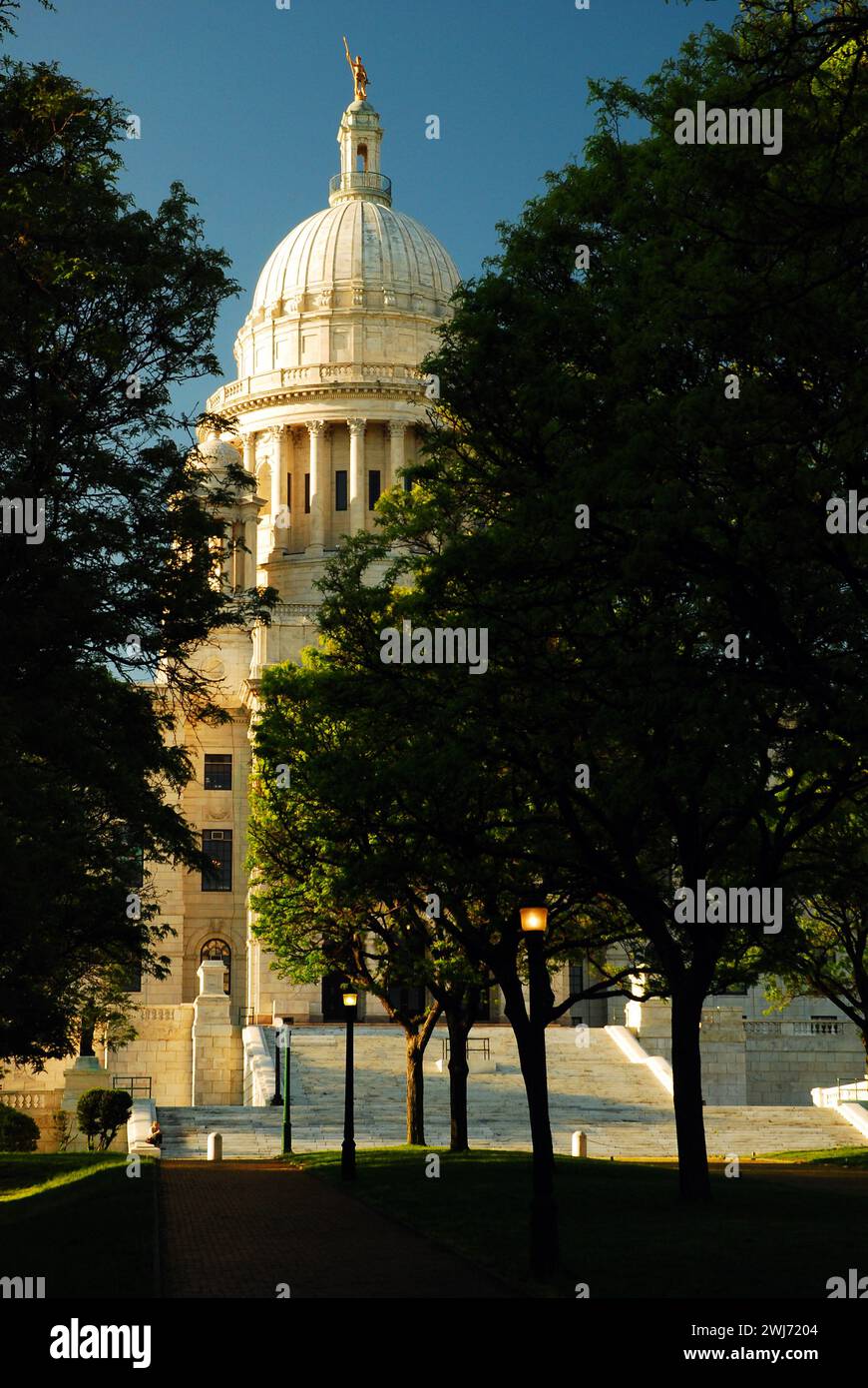 The dome of the Rhode Island State Capitol in Providence rises of the trees on the plaza and is home to the state government and politics Stock Photo