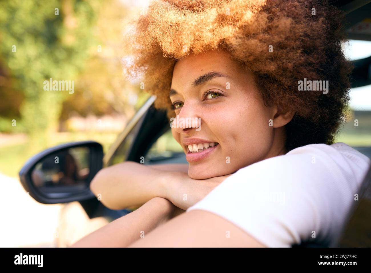 Woman Looking Out Of Passenger Car Window On Road Trip Vacation Stock ...
