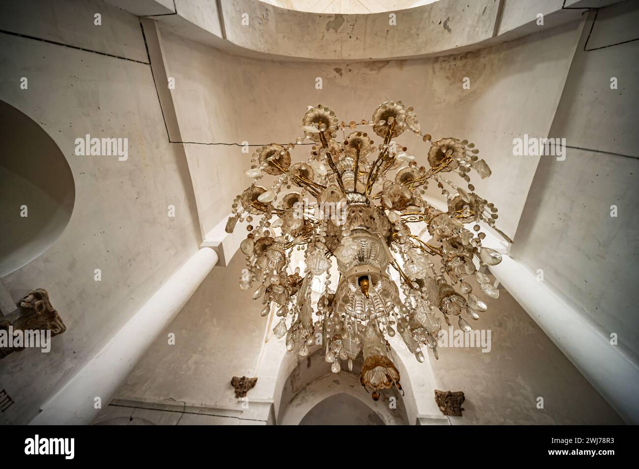 Ceiling with a grand glass chandelier Stock Photo