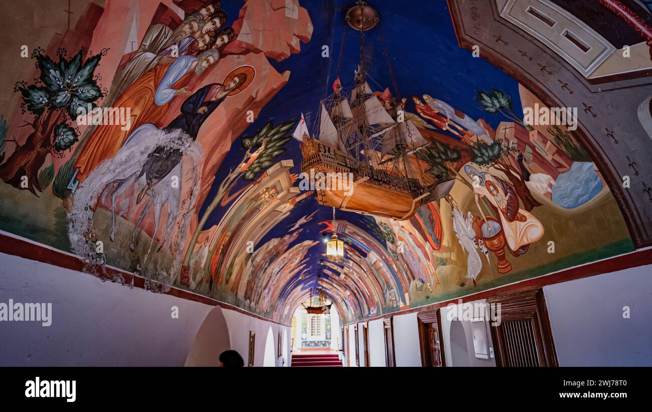 A hallway with beautifully painted ceiling, vaulted ceilings, and ...