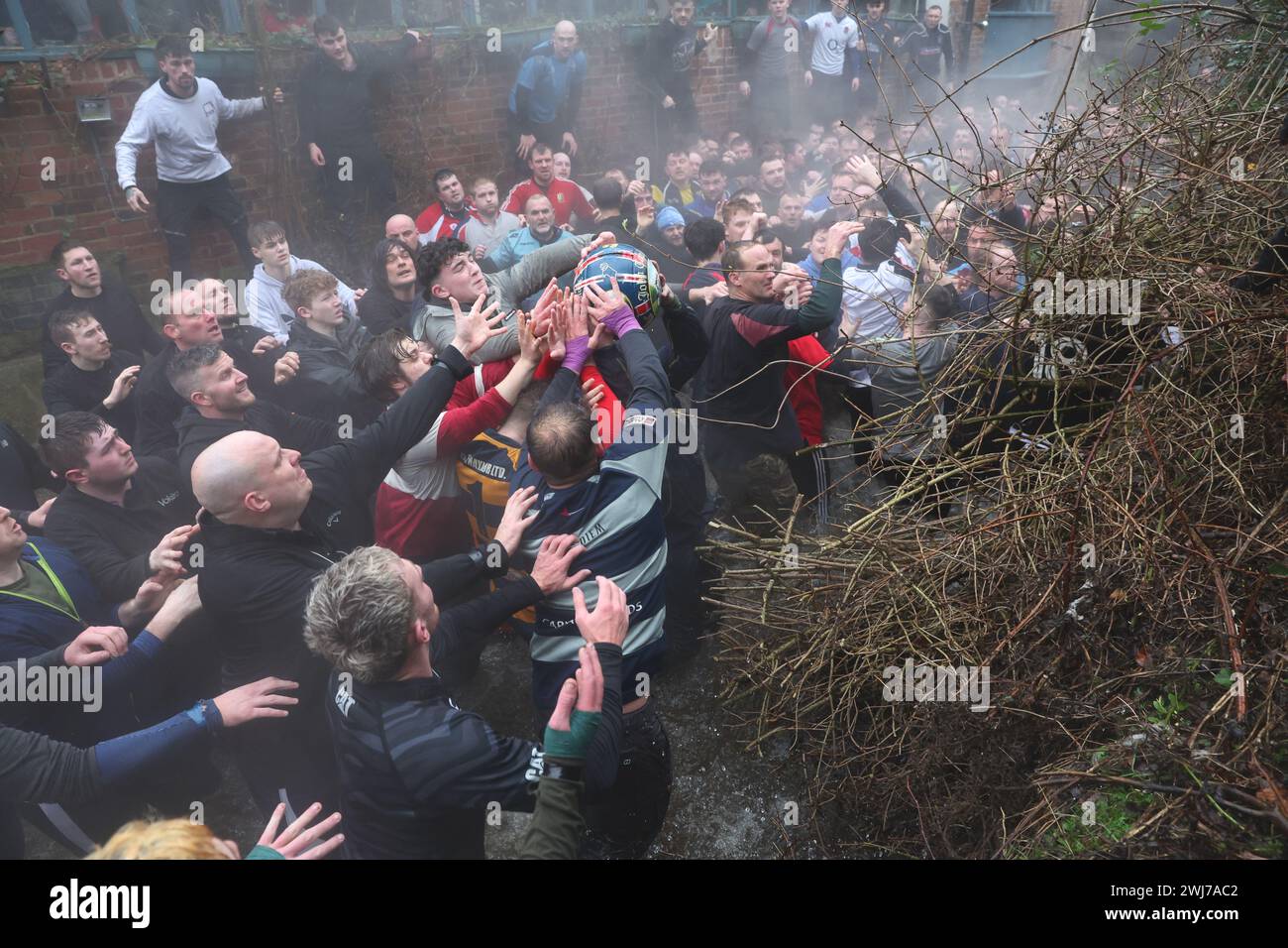 The Royal Shrovetide Football match has been played between the villagers of Ashbourne in Derbyshire since 1667. One side is known as the Upards and the other side as the Downards. Each team attempts to carry the ball back to their own goal to score. Picture credit should read: Cameron Smith/Sportimage Credit: Sportimage Ltd/Alamy Live News Stock Photo