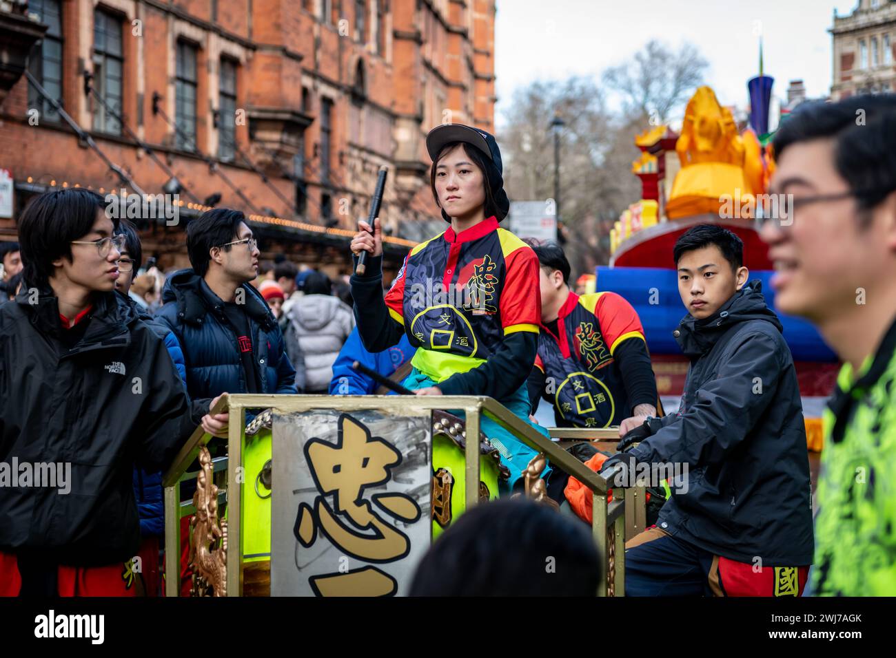 London. UK- 02.11.2024. A female drummer performing in the Chinese New Year celebration parade in China Town. Stock Photo