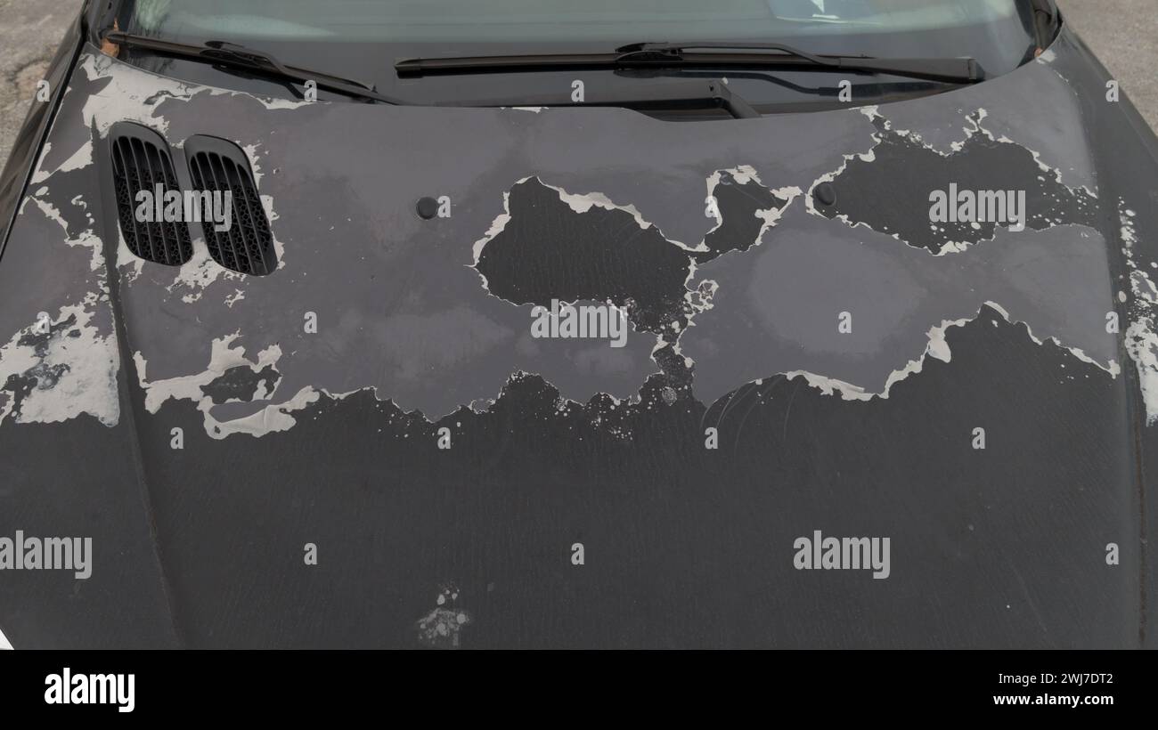 car used peeling black paint on grunge hood vehicle of old automobile Stock Photo Alamy