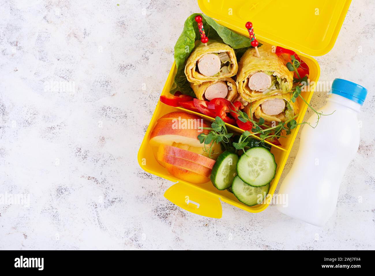 School lunch box with sausage roll in omelette with lavash. Lunchbox ...