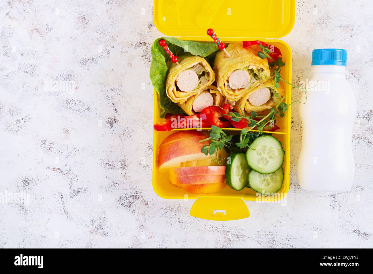 School lunch box with sausage roll in omelette with lavash. Lunchbox ...