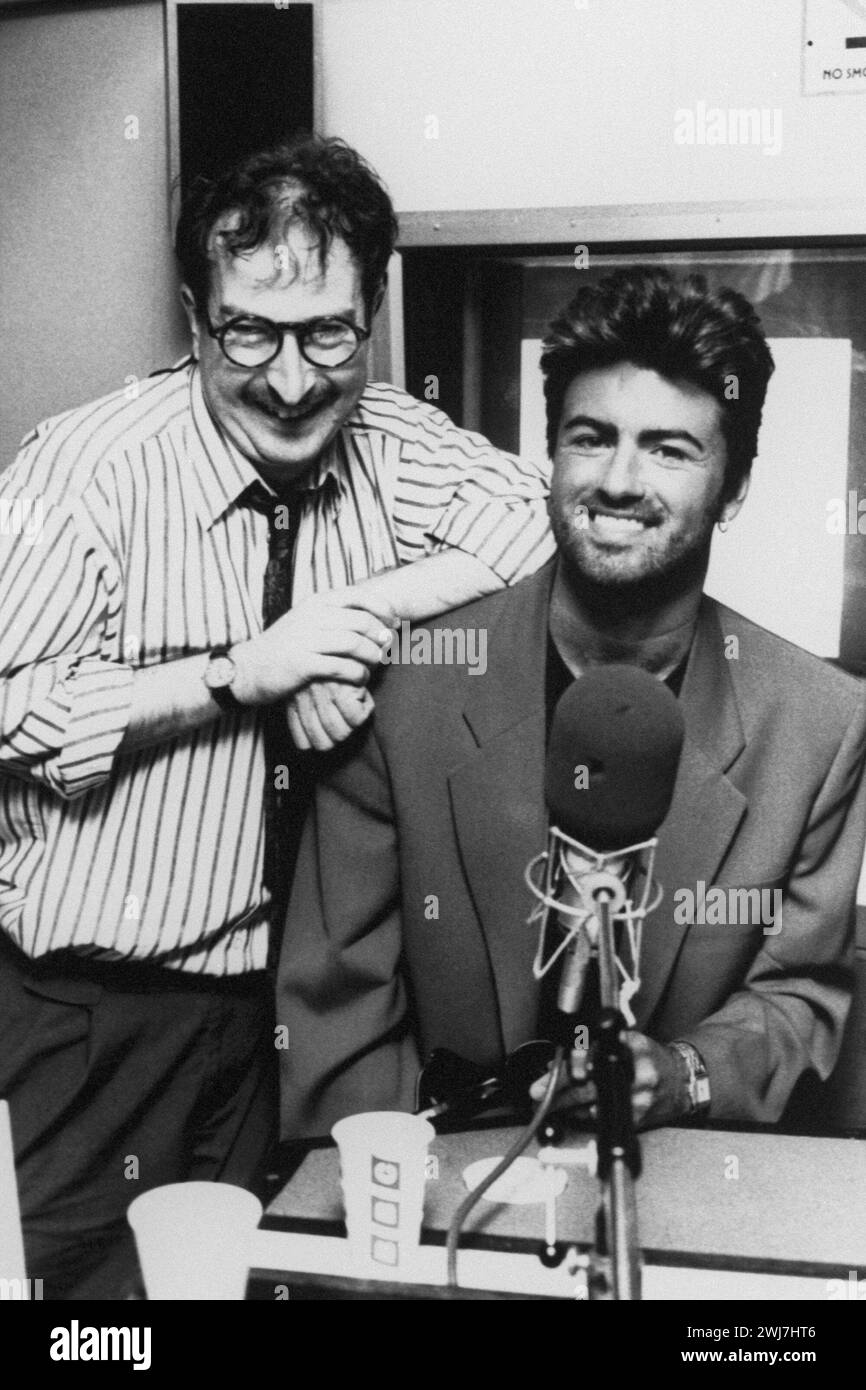 File photo dated 31/08/90 of George Michael pictured with BBC Radio 1 DJ Steve Wright, who has died at the age of 69, according to BBC News. A statement shared to BBC News by Wright's family said: 'It is with deep sorrow and profound regret that we announce the passing of our beloved Steve Wright.' Stock Photo