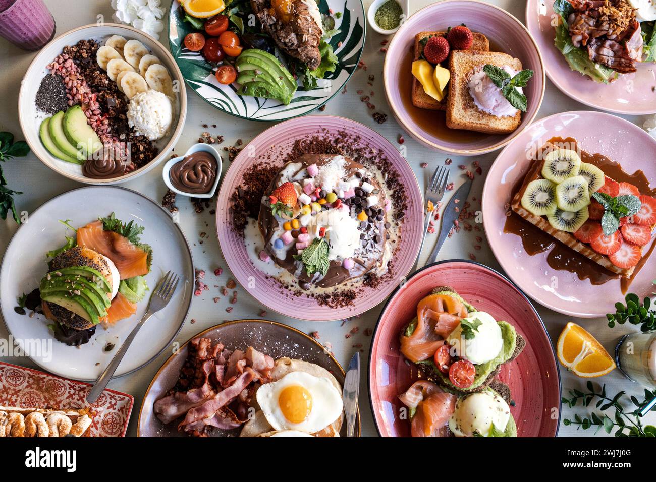 Lunch. Family breakfast or brunch served on a table. Aerial view. Stock Photo