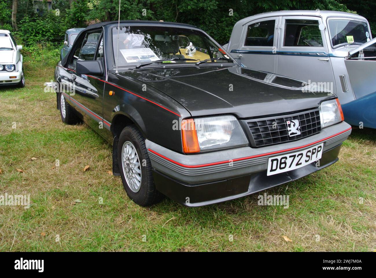 A 1987 Vauxhall Cavalier convertible Mk 2 parked on display at the 48th Historic Vehicle Gathering, Powderham, Devon, England, UK. Stock Photo
