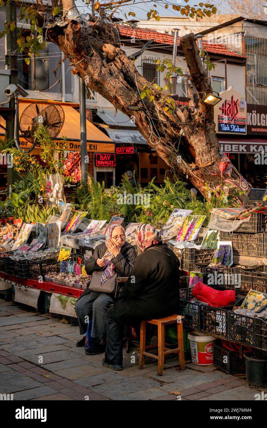 Whispers of Wisdom: Capturing Timeless Conversations on the Streets of Izmir Stock Photo