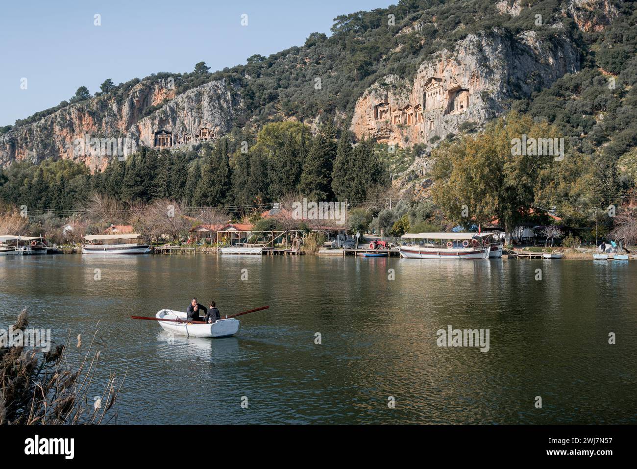 Sunny Days and Ancient Ways: Exploring Dalyan's Majestic Tombs by the River Stock Photo