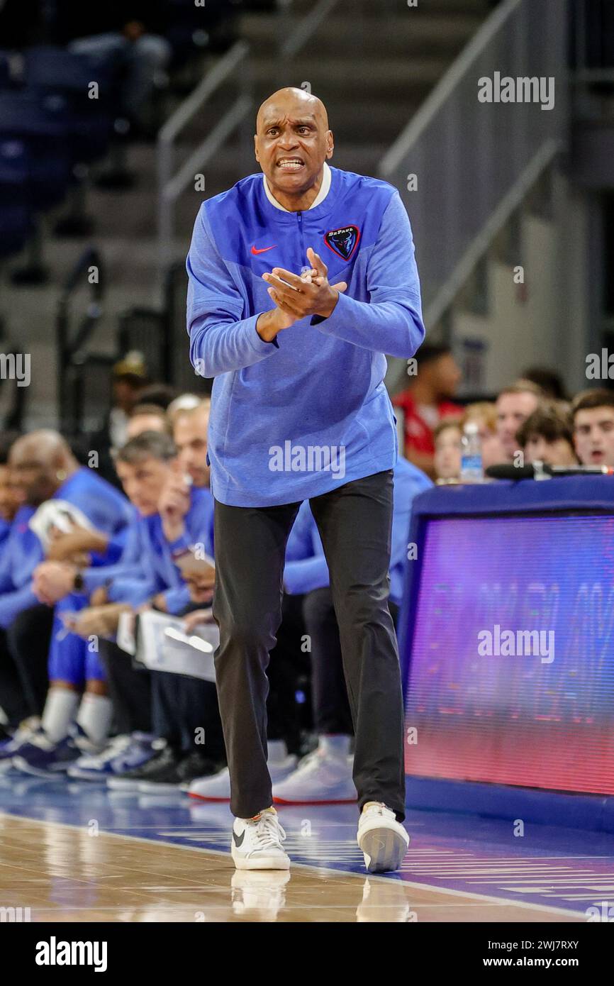 Tony Stubblefield, head coach cheering on DePaul Men's Basketball team at Wintrust Arena in Chicago, IL. Stock Photo
