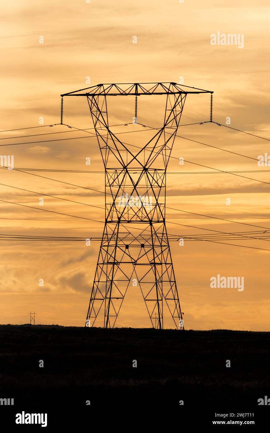 High voltage transmission lines and tower in Eastern Oregon. Stock Photo