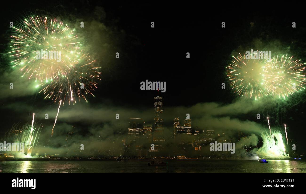 New years eve New York Manhattan fireworks. Fireworks over Manhattan. New York City 4th of July Fireworks. New York City Skyline Manhattan with Flashi Stock Photo