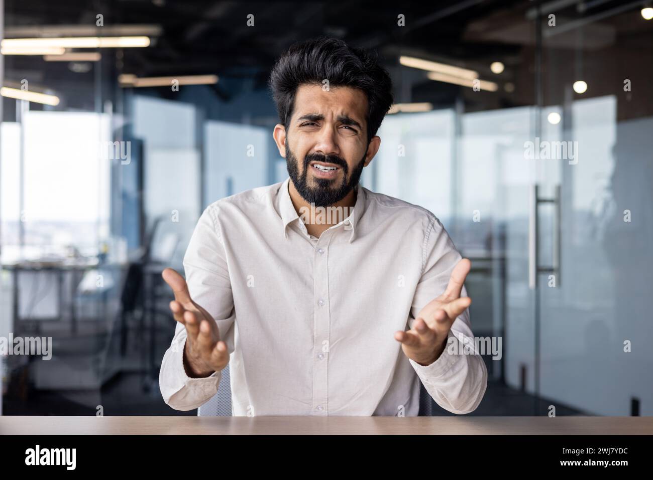 Indian businessman talking camera making hi-res stock photography and ...