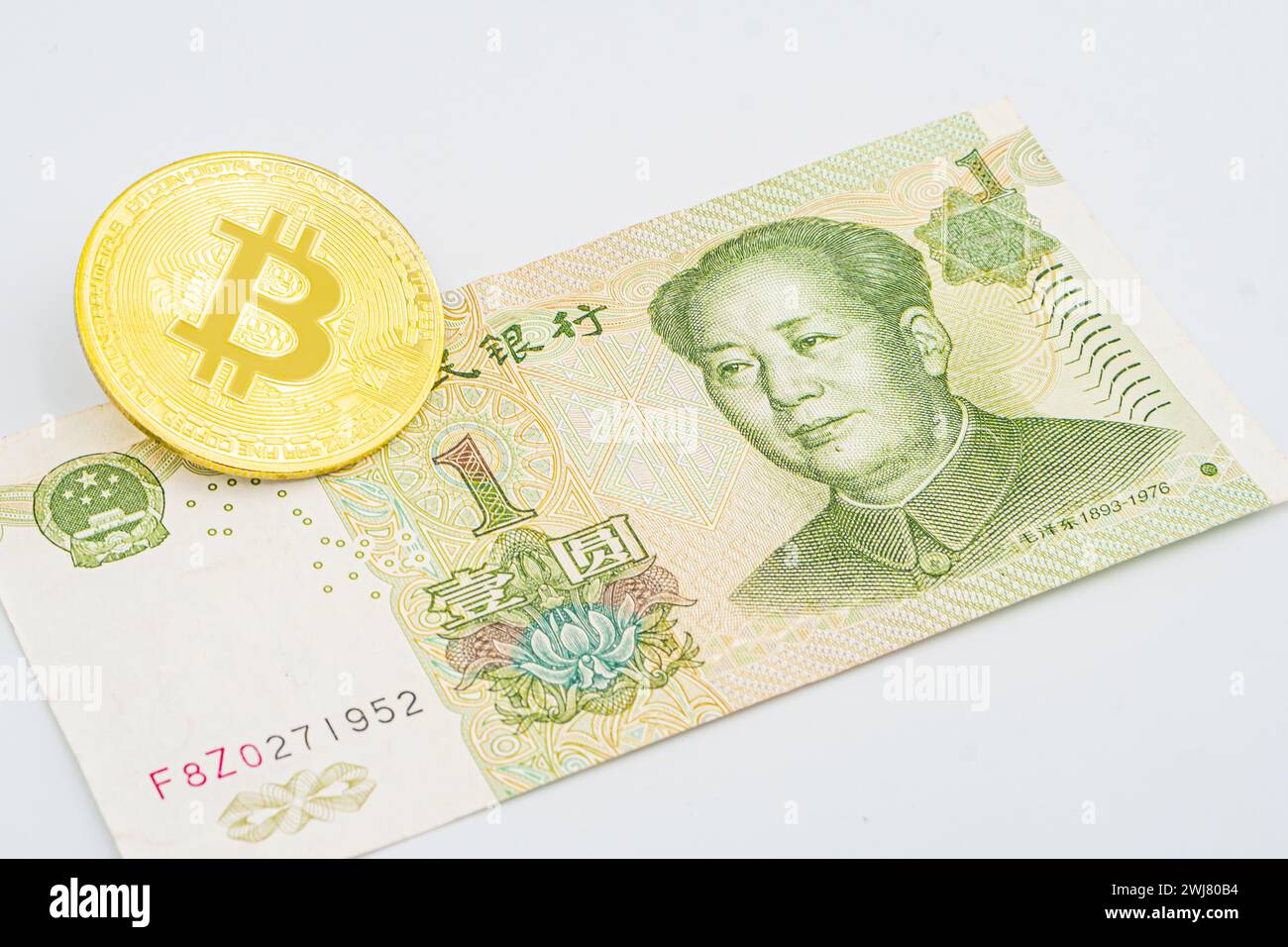 Cryptocurrency Bitcoin and Chinese 100 yuan banknote. Business concept of  new virtual money Stock Photo - Alamy