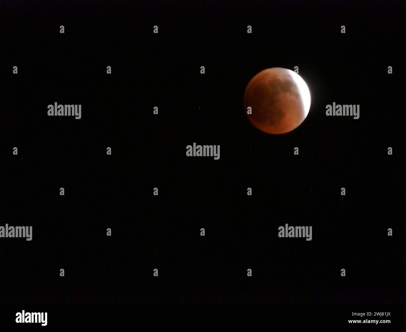 Super blood moon eclipse over Mexico City on January 22 Stock Photo - Alamy