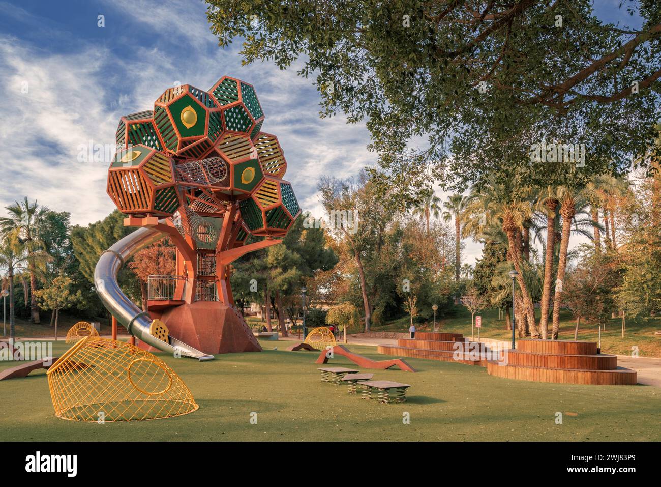 Garden area for recreation and sports with games for children in the Malecon Garden Park in the capital of the region of Murcia, Spain, Europe. Stock Photo