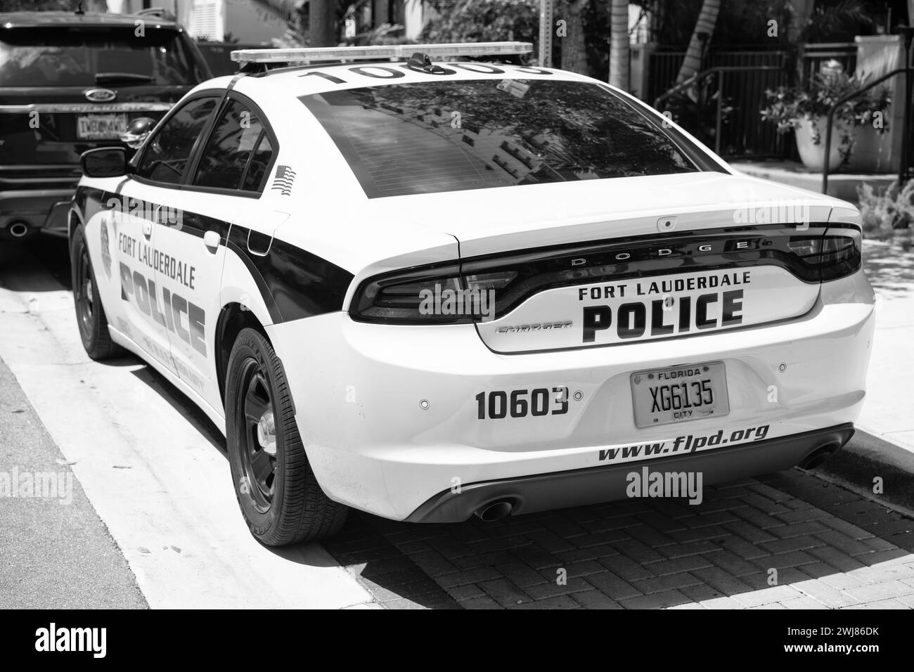 Miami, Florida USA - March 25, 2023: Dodge Charger police emergency car in miami fort lauderdale, back view. Stock Photo