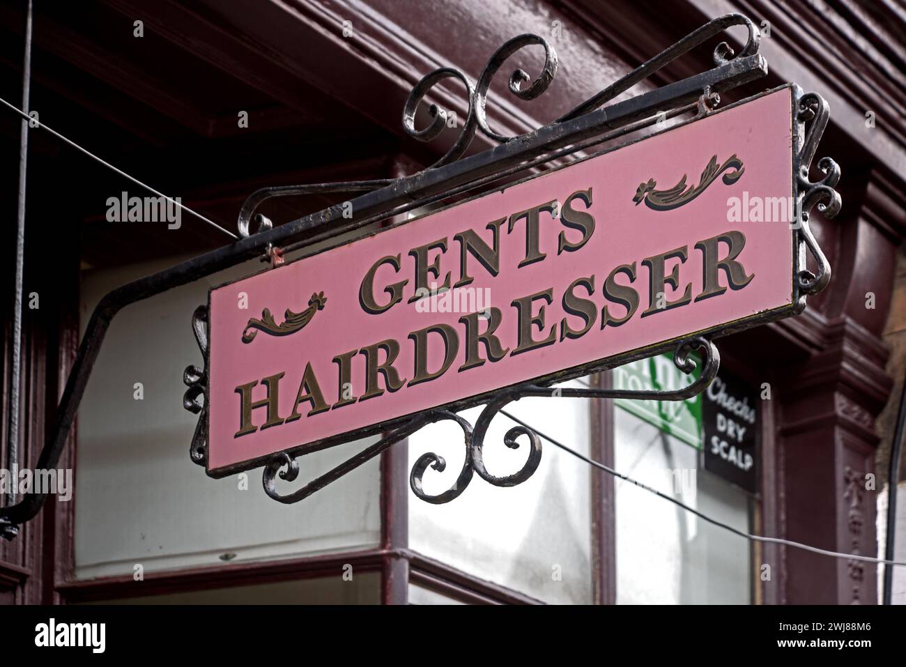 Gents Hairdresser sign outside a traditional barber shop in Raeburn Place, Stockbridge, Edinburgh, Scotland, UK. Stock Photo