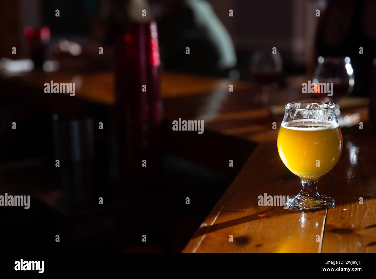 Craft Beer on a Bar freshly poured Stock Photo