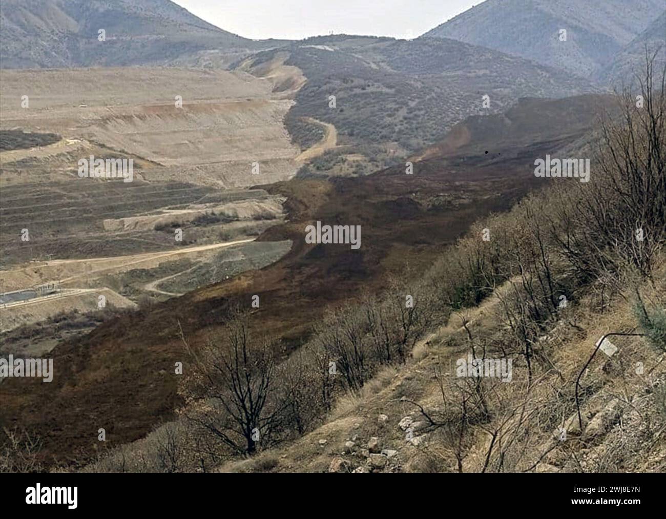 Erzincan, T?Rkiye. 13th Feb, 2024. Photo taken on Feb. 13, 2024 shows the scene of a landslide in a gold mine area in the Ilic district of Erzincan Province, T¨¹rkiye. At least nine workers were believed to be trapped in a landslide in a gold mine area on Tuesday in the Ilic district, local NTV reported, citing local authorities. Credit: Mustafa Kaya/Xinhua/Alamy Live News Stock Photo