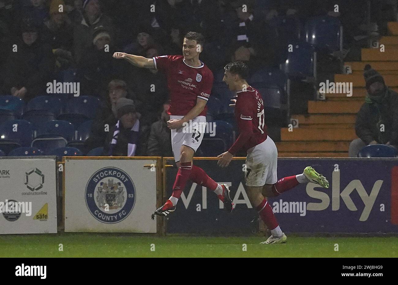 Crewe Alexandra's Ed Turns (left) celebrates scoring his side's second goal of the game during the Sky Bet League Two match at Edgeley Park, Stockport. Picture date: Tuesday February 13, 2024. Stock Photo