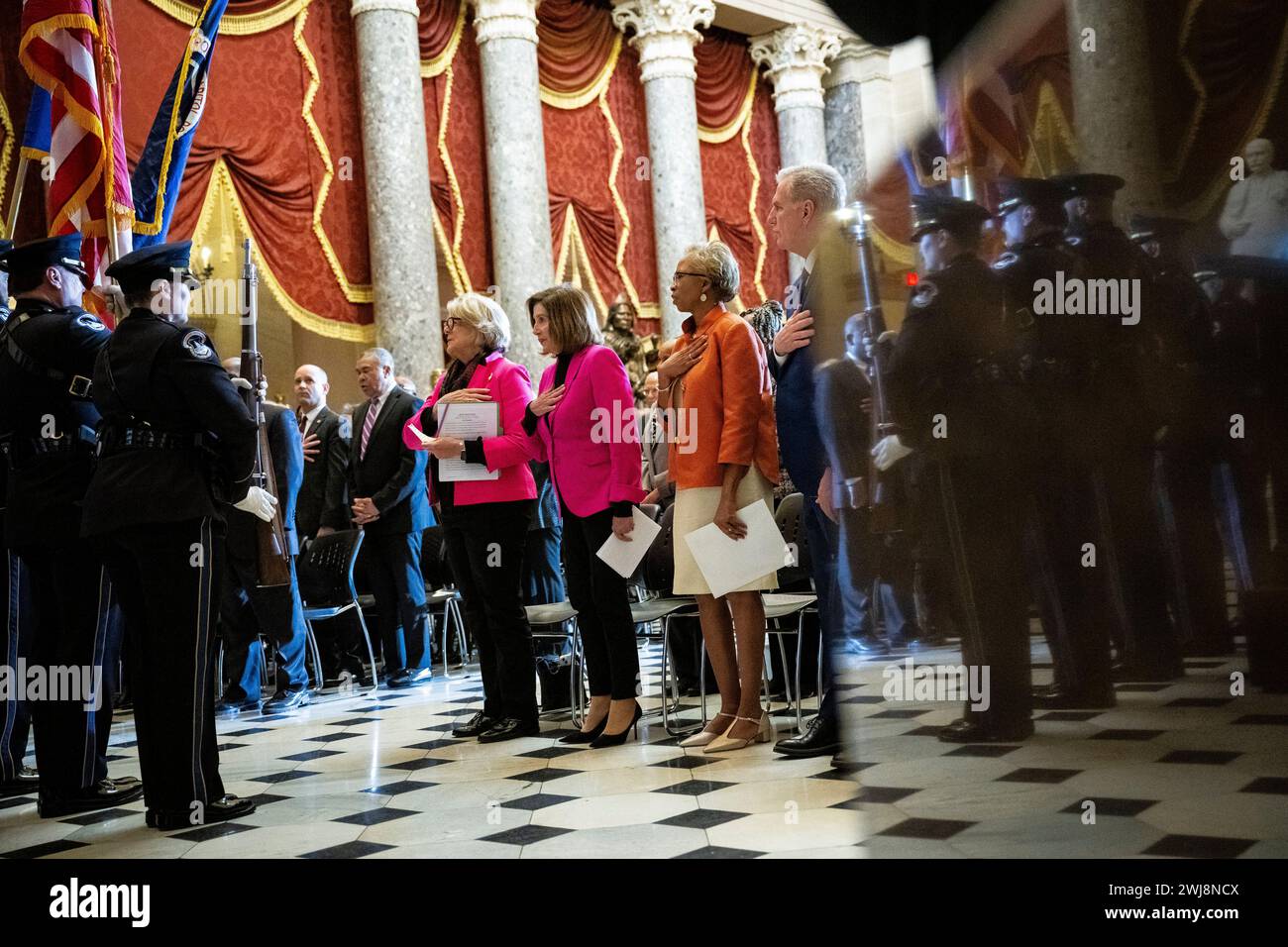 Washington, USA. 13th Feb, 2024. Left-to-right: United States Capitol Historical Society President and CEO Jane Campbell; Representative Nancy Pelosi (D-CA), a former Speaker of the House; former House Clerk Cheryl Johnson; and former House Speaker Kevin McCarthy (R-CA) stand to recite the pledge of allegiance during a flag presentation, during the U.S. Capitol Historical Society 2023 Freedom Award Ceremony, at the U.S. Capitol in Washington, DC, on Tuesday, February 13, 2024. (Graeme Sloan/Sipa USA) Credit: Sipa USA/Alamy Live News Stock Photo