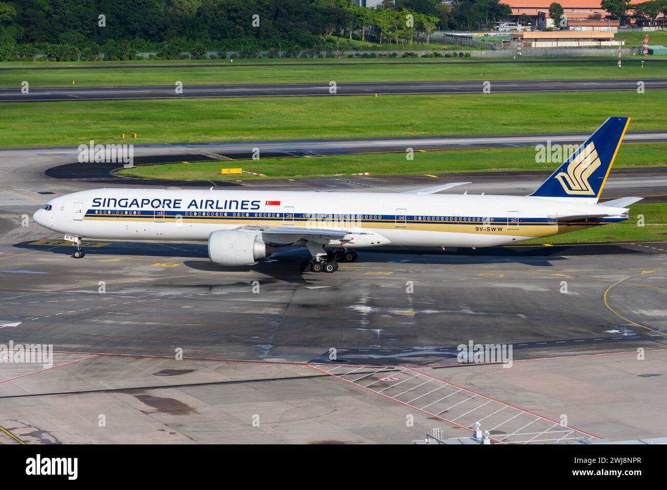 Singapore Airlines Boeing 777 at Changi Airport. Plane B777 taxiing. Airplane 777-300ER of Singapore Airlines registered as 9V-SWW. Stock Photo