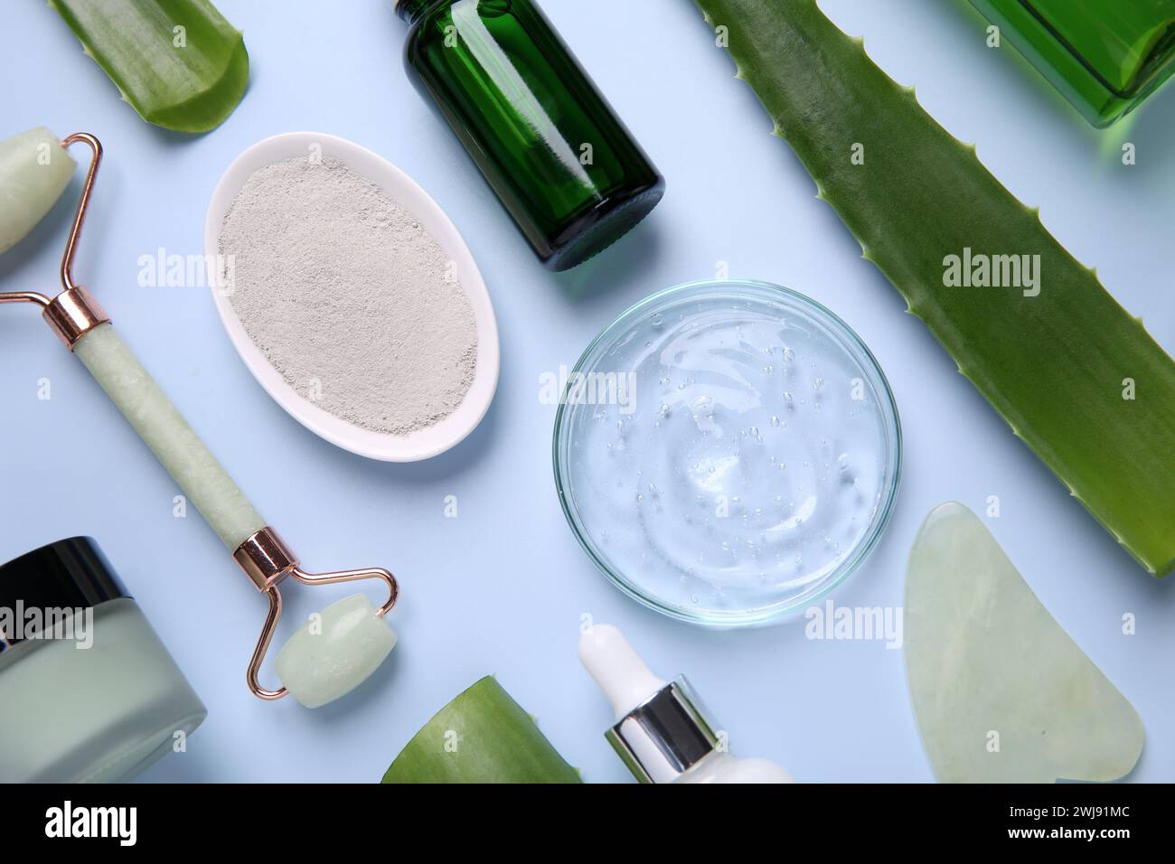 Flat lay composition with cosmetic products and cut aloe leaves on ...