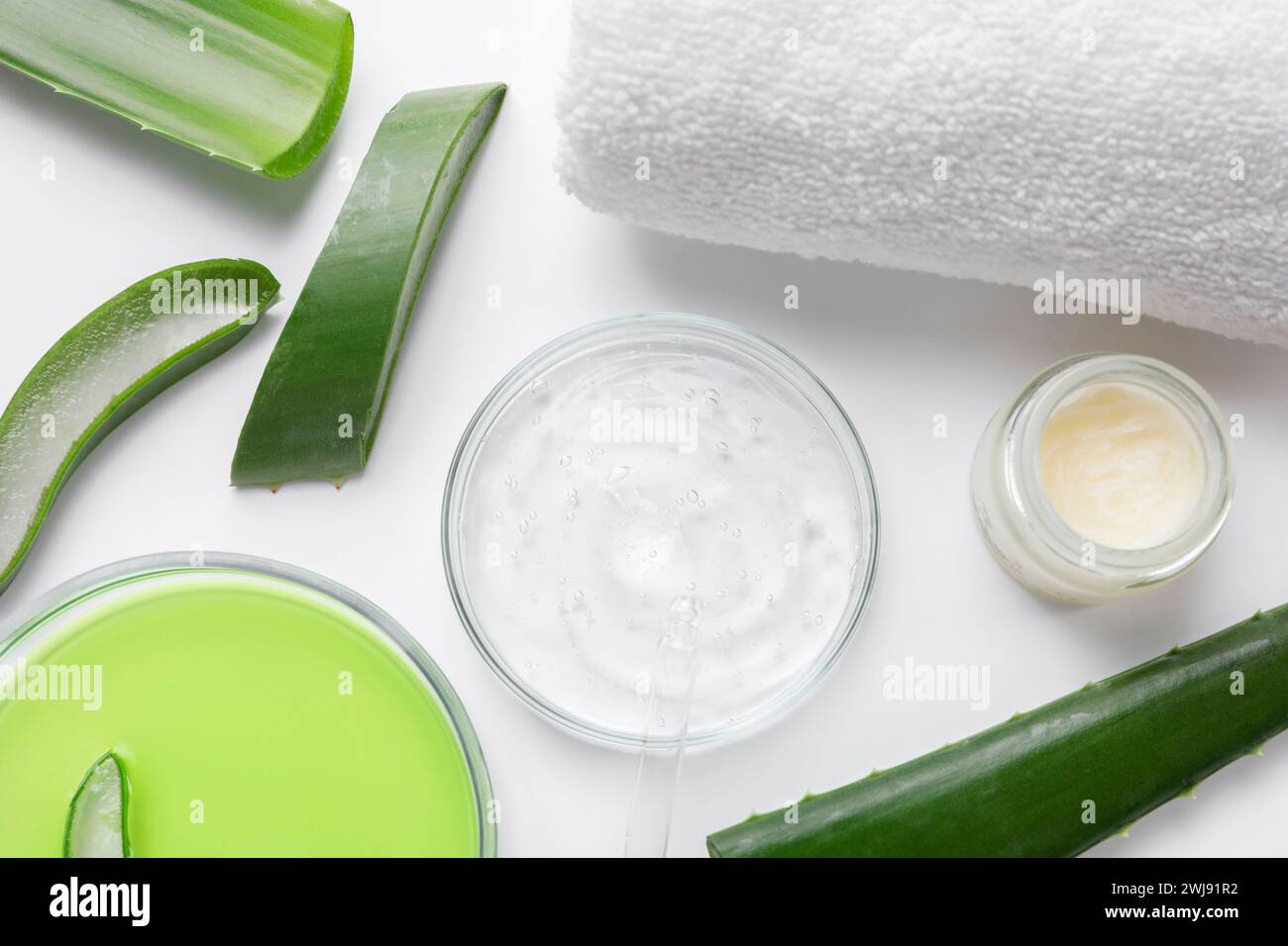 Flat lay composition with cosmetic products and cut aloe leaves on ...