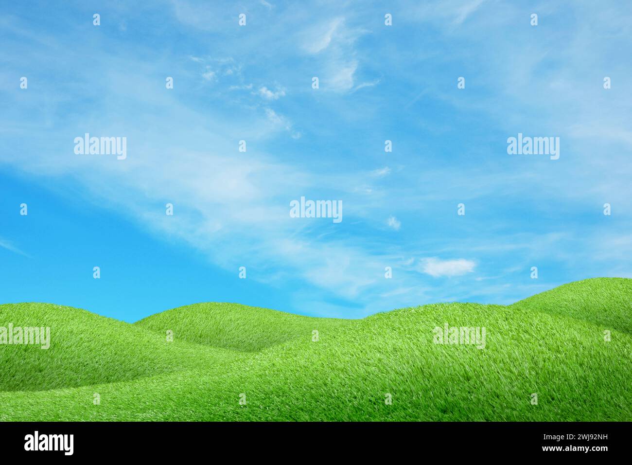 Lush green grass under blue sky with clouds Stock Photo - Alamy