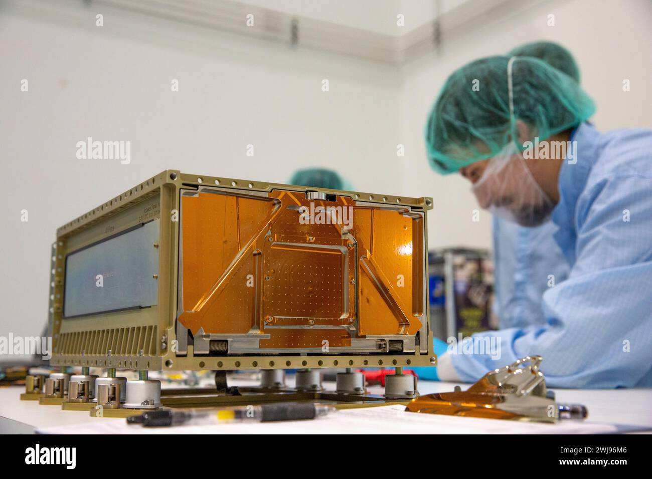 Engineers working on CubeSats for Artemis I Stock Photo
