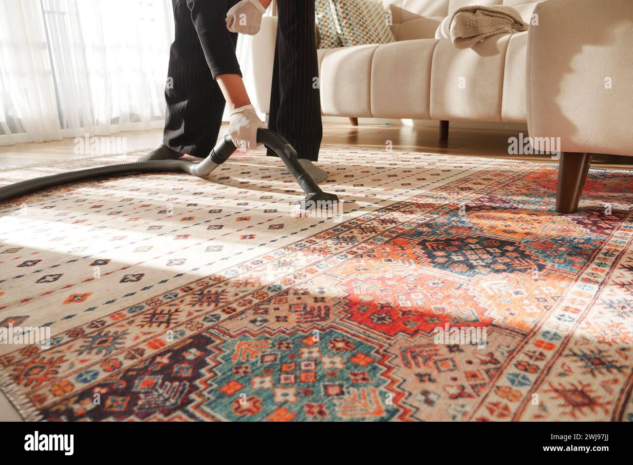 women cleaning with vacuum cleaner carpet Stock Photo - Alamy