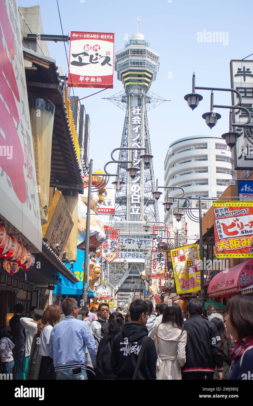 Shinseikai Food Street Signs in front of Tsutenkaku Tower