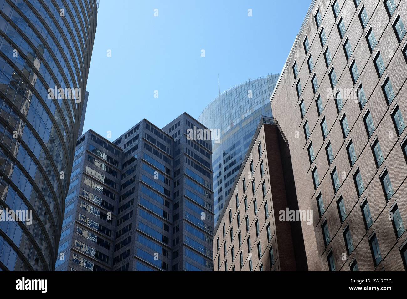 Geometric shapes & classic curves, 50 years of Architecture 4 landmark buildings w/ Aurora Place by Renzo Piano looking up at the Sydney Skyline Stock Photo