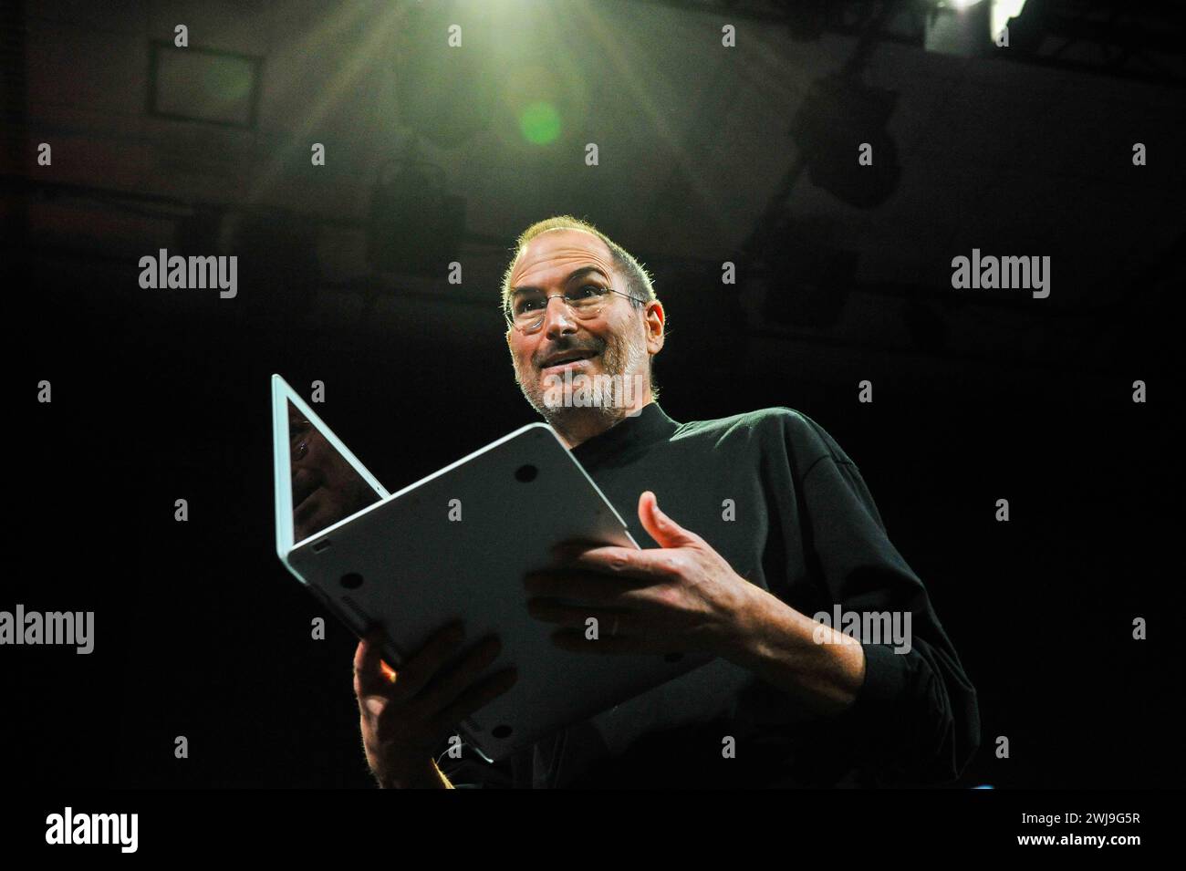 Apple's chief executive officer Steve Jobs unveils a new MacBook Air at