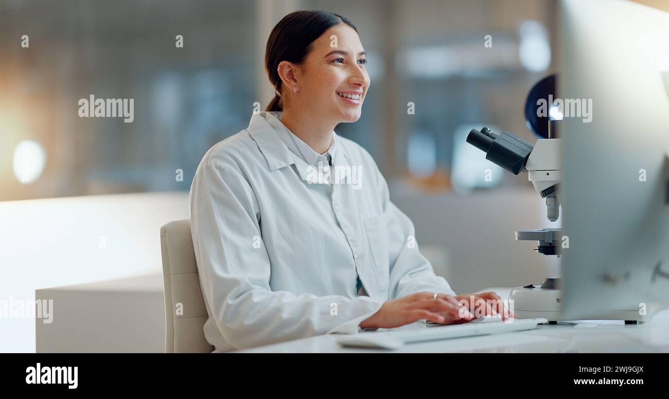 Science, research and happy woman with computer, typing and biotech ...