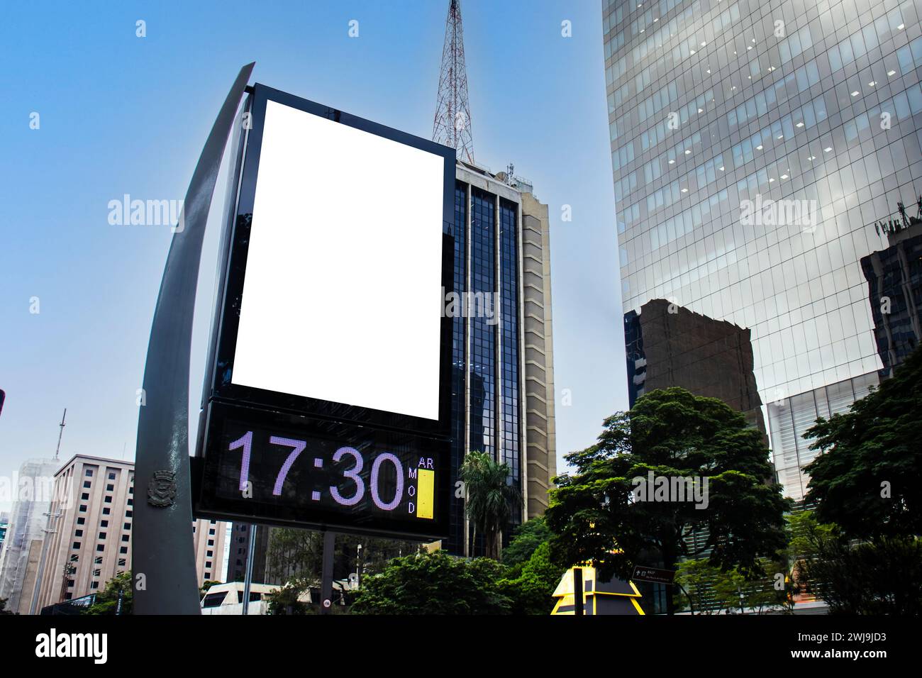 Billboard blank mock up in the city of Sao Paulo. Use this photo day mockup for your outdoor design. Stock Photo
