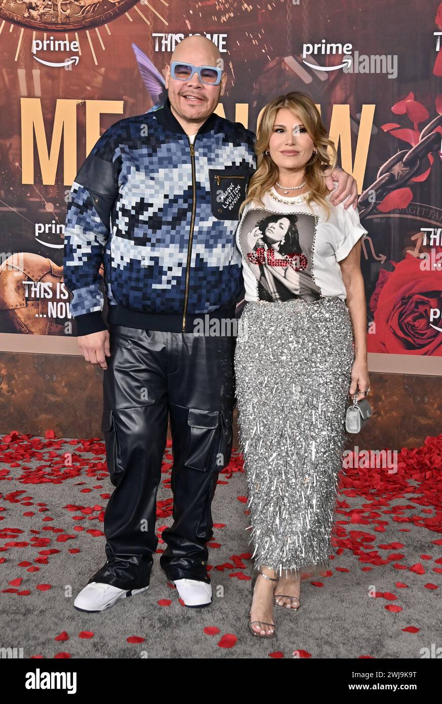 Hollywood, USA. 13th Feb, 2024. Fat Joe and Loren Ridinger arriving at ...