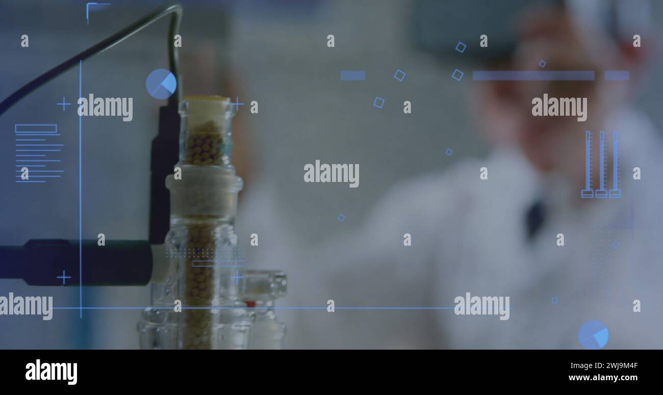 Scientist analyzing data in a laboratory setting Stock Photo