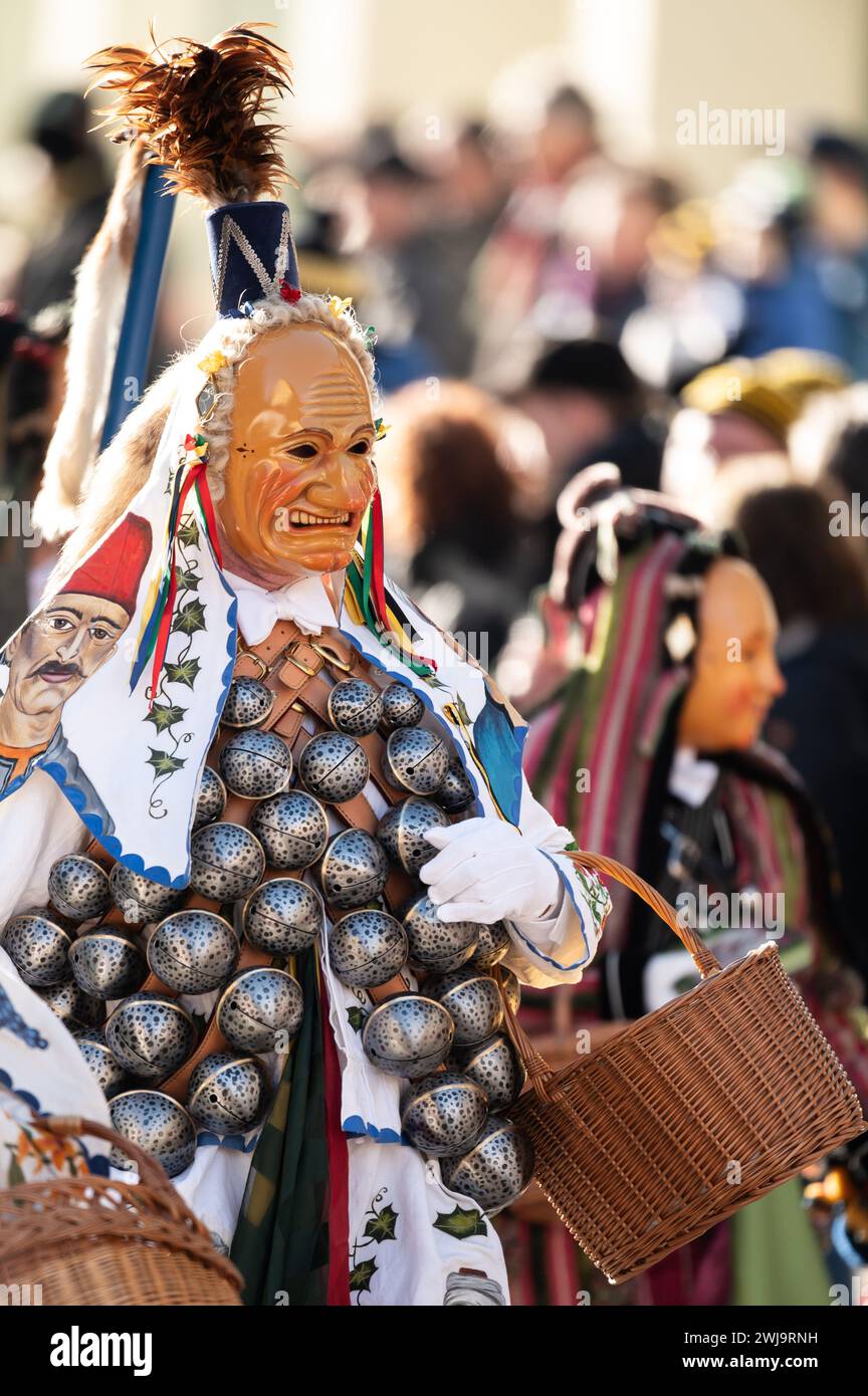 Rottweil, Germany. 13th Feb, 2024. A bite, a Rottweiler jester figure ...